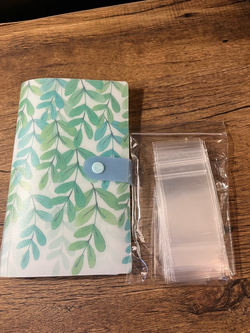 Leaf Print Jewelry Travel Folio with Light Blue Snap with extra jewelry bags.